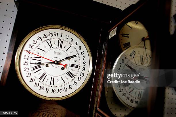 Clock hangs on the wall at Brown?s Old Time Clock Shop March 6, 2007 in Plantation, Florida. This year day light savings time happens three weeks...