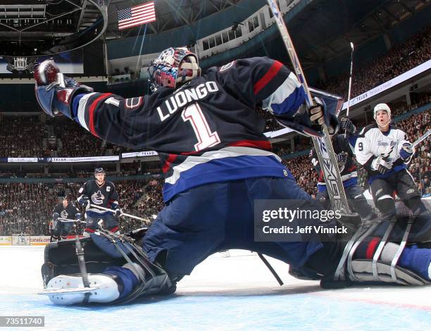 Roberto Luongo of the Vancouver Canucks makes a glove save off the shot of Eric Perrin of the Tampa Bay Lightning on March 6, 2007 at General Motors...