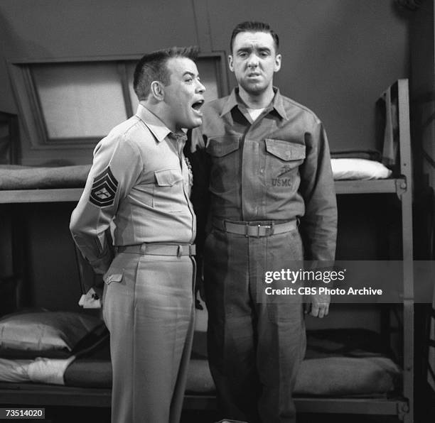 American actor Frank Sutton , as Sergeant Carter, shouts at actor and singer Jim Nabors, as Gomer Pyle, as the latter stands at attention on the set...