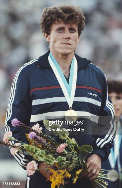 Jarmila Kratochvílova of Czechoslovakia stands on the podium after receiving her gold medal for winning the Women's 800 metres event at the IAAF...