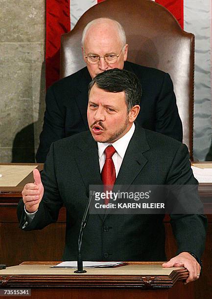 Washington, UNITED STATES: King Abdullah II of Jordan addresses a joint meeting of Congress with US Vice President Dick Cheney sitting behind, at the...