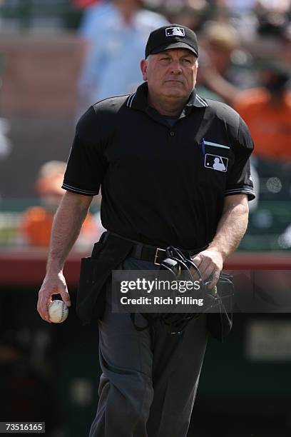 Umpire Ed Montague looks on during the game against the Los Angeles Angels of Anaheim at Scottsdale Stadium in Scottsdale, Arizona on March 6, 2007....