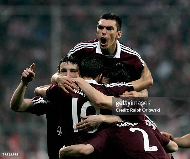 Mark van Bommel, Roy Makaay, Lucio and Willy Sagnol of FC Bayern Munich celebrate Makaay's goal against Real Madrid during the UEFA Champions League...