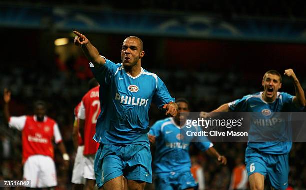 Alex of PSV celebrates after scoring his team's equalising goal during the UEFA Champions League round of sixteen, second leg match between Arsenal...