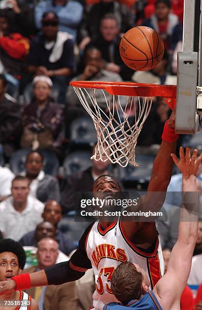 Shelden Williams of the Atlanta Hawks follows up a teammate's shot against the Washington Wizards at Philips Arena March 7, 2007 in Atlanta, Georgia....