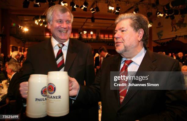 German Agriculture and Consumer Protection Minister Horst Seehofer and Kurt Beck, chairman of Germany's social democratic party drink beer at the...