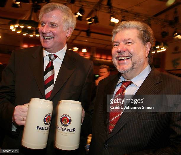 German Agriculture and Consumer Protection Minister Horst Seehofer and Kurt Beck, chairman of Germany's social democratic party drink beer at the...