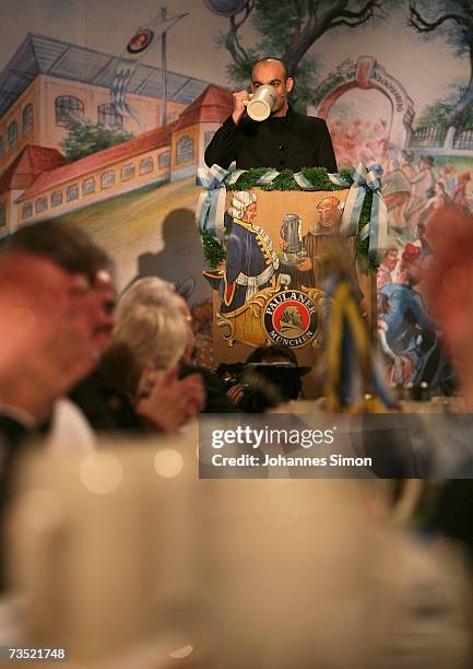 Comedian Django Asuel supps beer at the Nockherberg beer hall on March 8 in Munich, Germany. Traditionally politicians and celebrities sit in the...