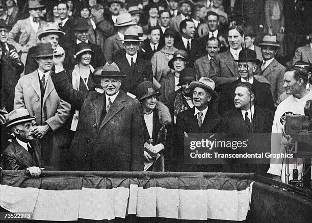 President Herbert Hoover throws out the first ball to open the 1930 season in April at Griffith Stadium in Washington, D.C.