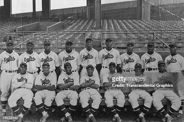 The Negro League Newark Eagles pose at home in Ruppert Stadium for a team portrait in 1939. Monte Irvin is in the back row, far left, and Mule...