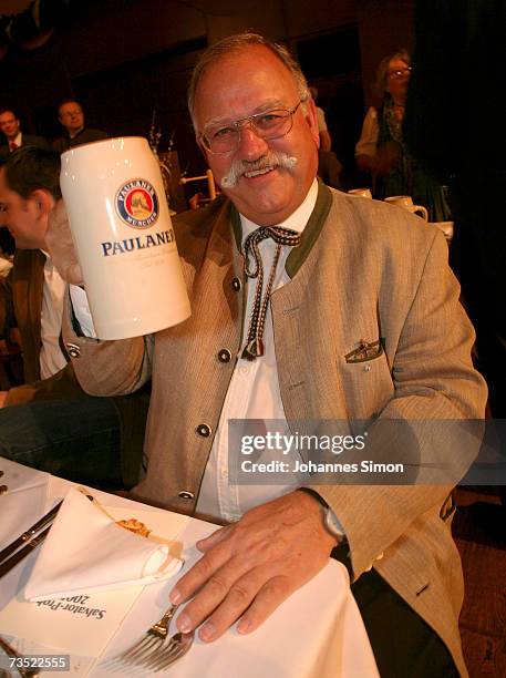 Ludwig "Wiggerl" Hagn poses with a beer tankard at the Nockherberg beer hall as the Strong Beer Season kicks off on March 8 in Munich, Germany....