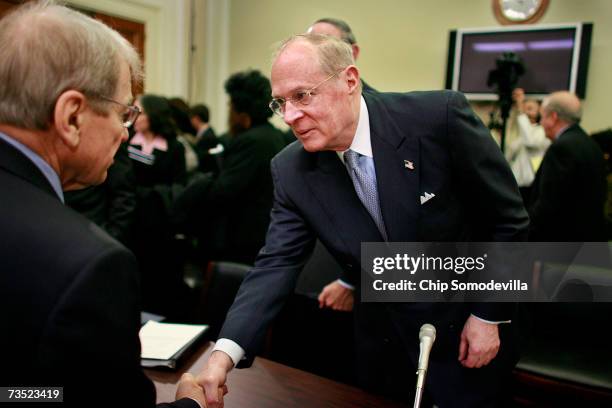 Supreme Court Justices Justice Anthony Kennedy talks with House Financial Services and General Government Subcommittee members after he testified to...