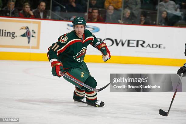 Dominic Moore of the Minnesota Wild skates against the San Jose Sharks during the game at Xcel Energy Center on March 6, 2007 in Saint Paul,...