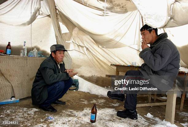 Kyrgyz labourers inhabit primitive camps close to the ruins of an old Soviet elctrolamp factory, where they scrape a living scavenging for nickel and...