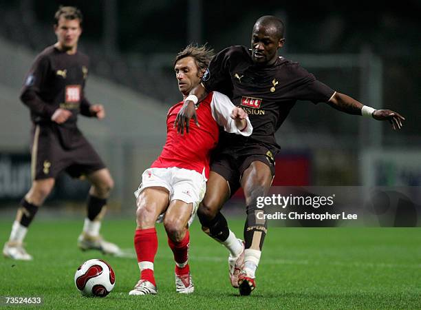 Joao Pinto of Braga battles with Didier Zokora of Spurs during the UEFA Cup Round of 16, first leg match between Braga and Tottenham Hotspur at the...