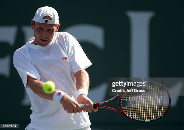 Rainer Schuettler of Germany returns a backhand to Stefano Galvani during the Pacific Life Open on March 8, 2007 at the Indian Wells Tennis Garden in...