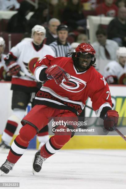 Anson Carter of the Carolina Hurricanes skates against the Ottawa Senators on February 27, 2007 at RBC Center in Raleigh, North Carolina. The...