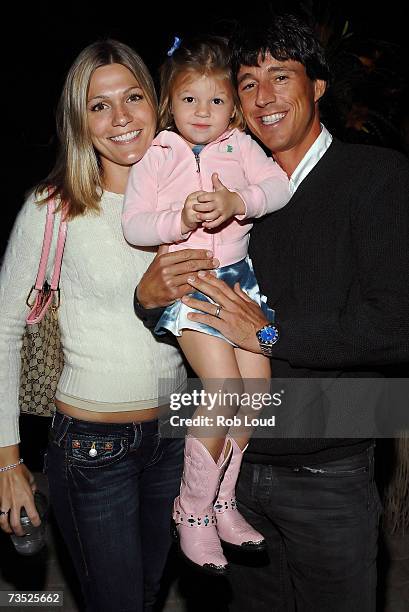 Tennis player Aaron Krickstein poses with wife Bianca and daughter Jade at the Oliver Group Champions Cup Kickoff Party at The Players Club on March...