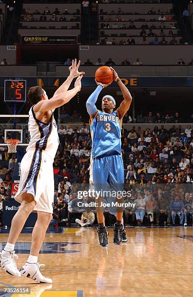 Allen Iverson of the Denver Nuggets shoots against Scott Padgett of the Memphis Grizzlies during the game at FedExForum on February 26, 2007 in...