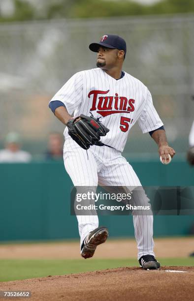 Johan Santana of the Minnesota Twins delivers the pitch during a Spring Training game against the Boston Red Sox on March 4, 2007 at Hammond Stadium...