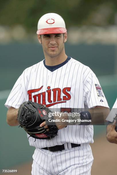 Joe Mauer of the Minnesota Twins gets ready on the field during a Spring Training game against the Boston Red Sox on March 4, 2007 at Hammond Stadium...