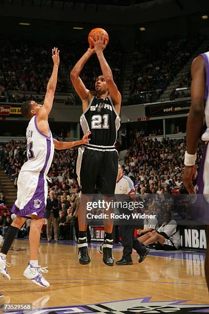 Tim Duncan of the San Antonio Spurs shoots the ball over Kevin Martin of the Sacramento Kings on March 8, 2007 at ARCO Arena in Sacramento,...