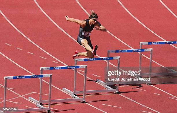 Brendan Cole of the ACT competes the mens 400 metre hurdles during day one of the Australian Athletics Championships and selection trials at...