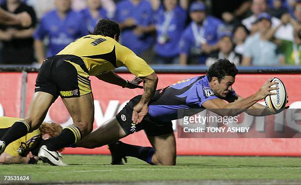 Australian Western Force wing Cameron Shepherd scores during their match against New Zealand Hurricanes at the rugby union Super 14 in Perth, 09...