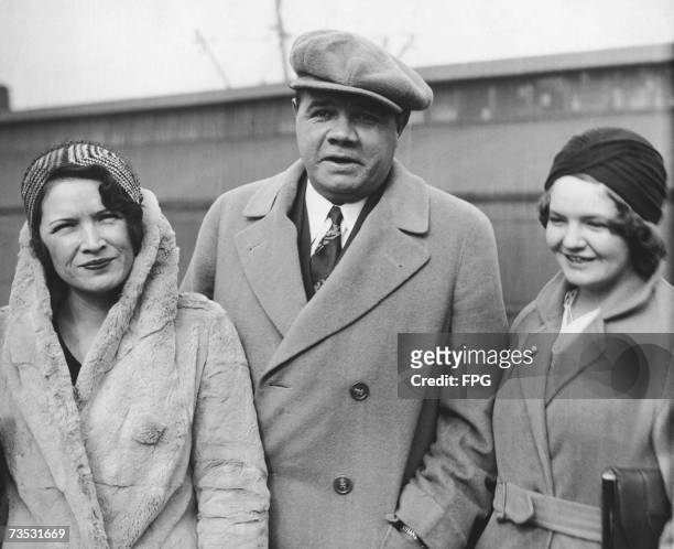 American baseball star George Herman 'Babe' Ruth with his wife Claire Hodgson and their adopted daughter Dorothy, circa 1935.