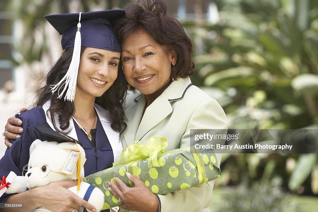 Female graduate student with mother, portrait