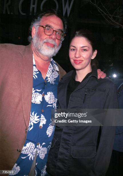Director Francis Ford Coppola poses with his daughter, director Sofia Coppola outside Mr. Chows restaurant December 30, 2000 in Beverly Hills, CA.