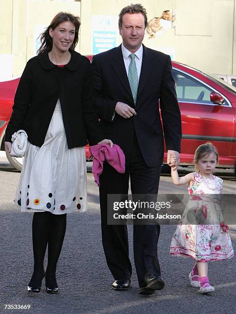 David and Samantha Cameron with their daughter Nancy at Christ Church Kensington as they arrive at the wedding of Alan Parker and Jane Hardman on...