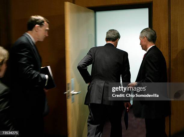 Director Robert Mueller leaves after holding a news conference at the bureau's headquaters March 9, 2007 in Washington, DC. Mueller was responding to...