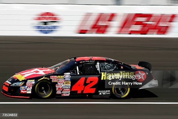 Juan Pablo Montoya, driver of the Texaco/Havoline Dodge, drives into the garage, during practice for the NASCAR Busch Series Sam's Town 300, at Las...