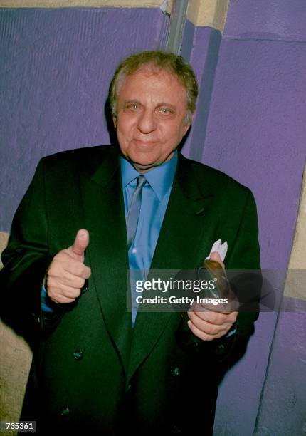 Studio musician/drummer Hal Blaine gives a thumbs up outside The Whiskey A Go-Go where singer Nancy Sinatra performed December 29, 2000 in Hollywood,...