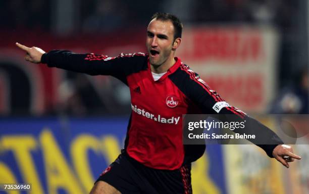 Robert Vittek of Nuremberg celebrates scoring his teams second goal during the Bundesliga match between 1. FC Nuremberg and Eintracht Frankfurt at...