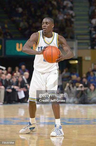 Darren Collison of the UCLA Bruins looks to move the ball against the Arizona Wildcats at Pauley Pavilion during the game on January 20, 2007 in Los...