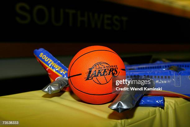 Southwest plane and a basketball of the Los Angeles Lakers on the check in counter during a pre-boarding event for the Lakers Youth Foundation at the...