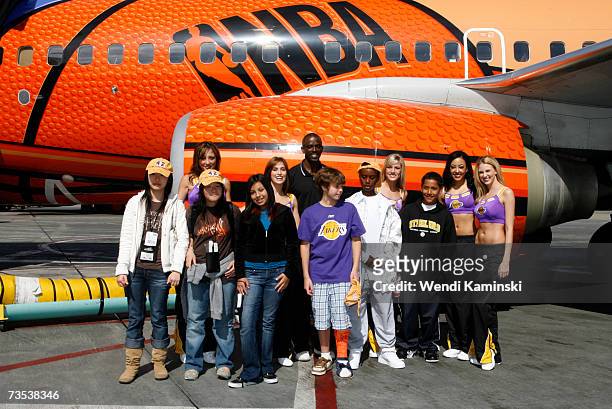 Los Angeles Lakers assistant coach Craig Hodges, The Laker Girls and student winners of the Lakers Youth Foundation and Southwest Airlines essay...