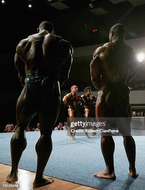 Vince Taylor and Dexter Jackson of the USA watch the other competitors during the 2007 IFBB Australian Bodybuilding Grand Prix VII at Dallas Brooks...