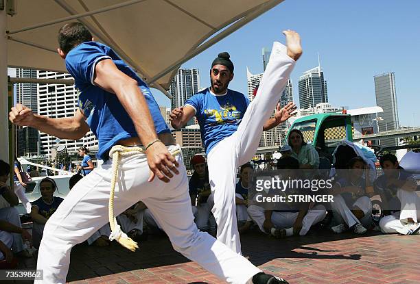 Dancers of the Grupo Capoeira Brazil perform at the 12th International capoeira festival in Sydney, 16 February 2007. The graceful acrobat or dance...