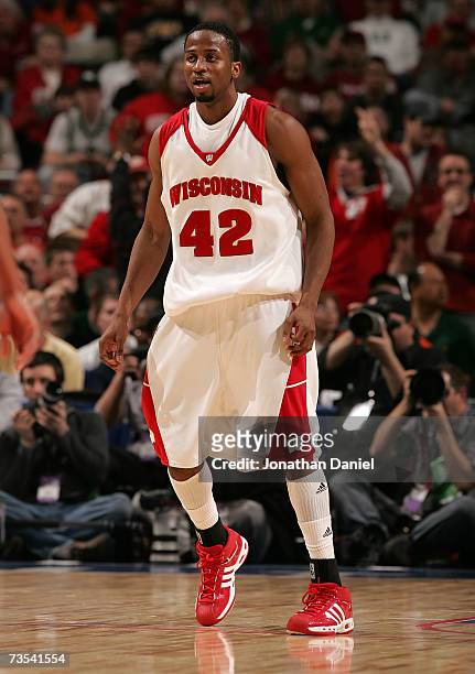 Alando Tucker of the Wisconsin Badgers walks on court against the Michigan State Spartans during the quarterfinals of the Big Ten Men's Basketball...