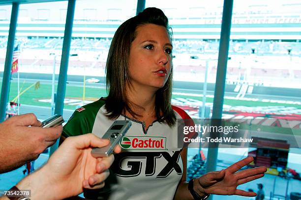 Funny car driver, Ashley Force, speaks to members of the media during practice for the NASCAR Nextel Cup Series UAW-DaimlerChrysler 400 at Las Vegas...