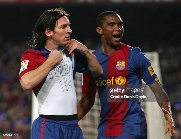Lionel Messi of Barcelona celebrates with Samuel Eto'o after scoring Barcelona's first goal during the Primera Liga match between Barcelona and Real...