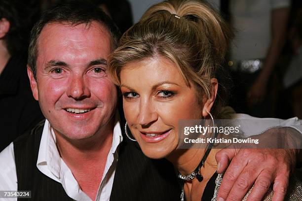 Actor Alan Fletcher and wife and TV Personality Jennifer Hanson attend the Independent Runway By Mini show on the sixth and final day of the L'Oreal...