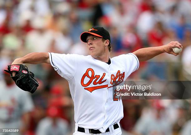 Adam Loewen of the Baltimore Orioles pitches against the St.Louis Cardinals during a Spring Training game at the Fort Lauderdale Stadium on March 10,...
