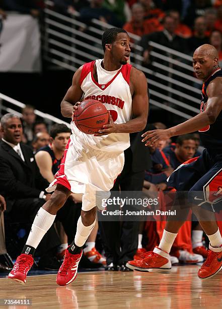 Alando Tucker of the Wisconsin Badgers moves with the ball against the Illinois Fighting Illini during the semifinals of the Big Ten Men's Basketball...