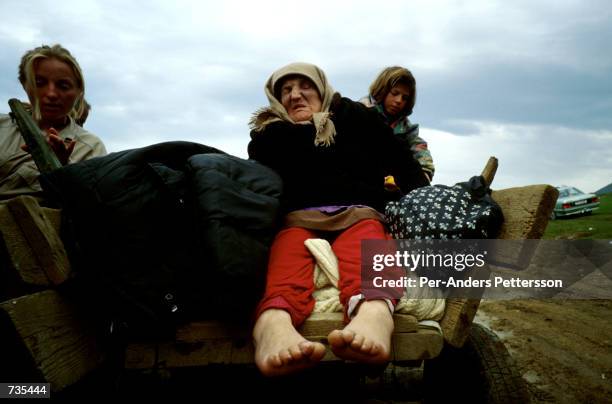 Ethnic Albanian refugees from Kosovo April 4, 1999 arrive at Morina borderpost outside Kukes, Albania. Tens of thousands of people fled the Serb...