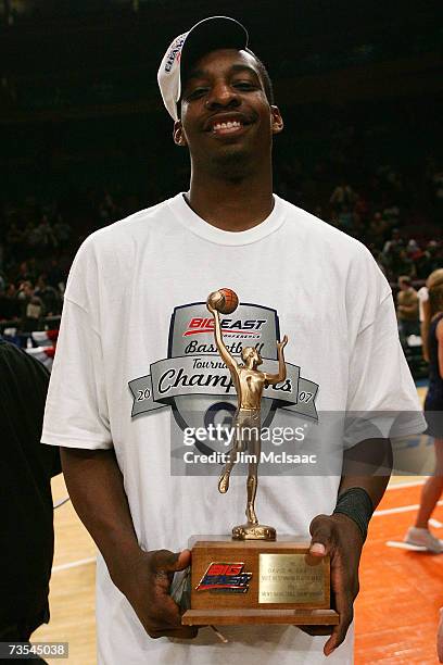 Jeff Green of the Georgetown Hoyas holds up the MVP trophy after defeating the Pittsburgh Panthers during the final of the Big East Championship at...