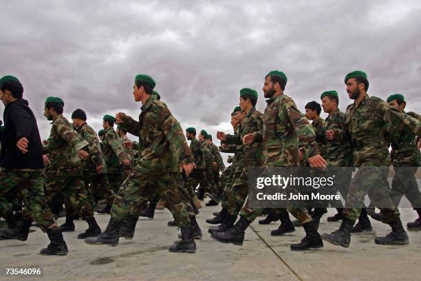Afghan Army soldiers march to a briefing at Camp Shorabak March 11, 2007 in Afghanistan's Helmand province. Tomorrow Afghan soldiers are due to head...
